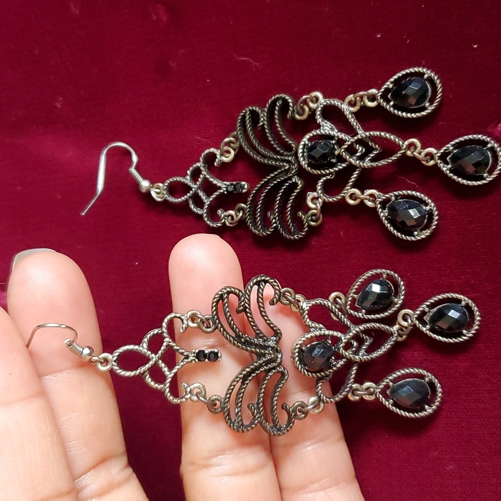 black earrings.